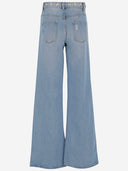 Jeans di denim di cotone Coperni con borchie