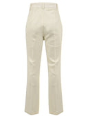 Crema di pantaloni di soffitta e fienile