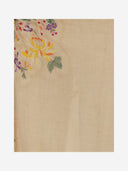 Faliero Sarti Pareo met bloemendecoratie