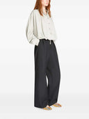 Pantaloni a pieghe con cintura Dries Van Noten