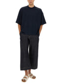Studio Nicholson Pantalone en mezclilla