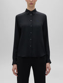 قمصان أسبيسي باللون الأسود