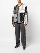 Childern af de uoverensstemmende trykt bandana bukser