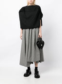 Comme des Garcons in lana ritagliata