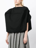 Comme des Garcons in lana ritagliata