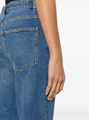 Jeans in denim svasati di Tory Burch