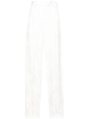 Los pantalones del logotipo de Attico