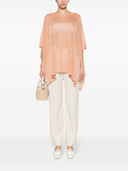 Fabiana Filippi a maglia semi di mantello