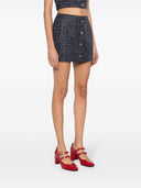 Alessandra Rich Squin은 트위드 미니 스커트를 확인했습니다