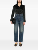 Jeans de mezclilla de cintura alta khaite