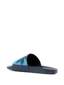 Diapositivas de la piscina de estampado de Palm de Paul Smith