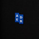 Adererror Tシャツとポロスブラック