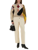 Moschino는 다이아몬드 패턴과 메쉬입니다