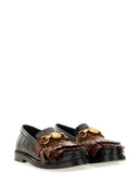 Moschino mocasín con flequillo y moneda