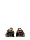 Moschino mocasín con flequillo y moneda