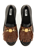Moschino mocasín con flequillo y moneda