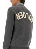 Golden Gänsepullover mit Schreiben auf dem Rücken