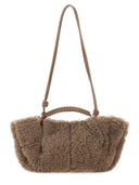 Her "Arta Curly" mini taske