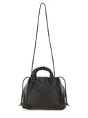 Her "Bombon smidig skinnende" medium taske