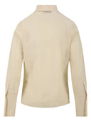 Crema di camicie di soffitta e fienile