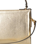 Coccinelle Bags.. Golden