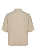 Camisa de girasol hecha de algodón.