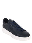 Zapatillas de zapatillas hechas de cuero