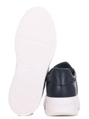 Zapatillas de zapatillas hechas de cuero
