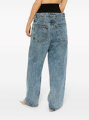 Jeans in denim a band a maglia alaia