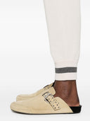 Panelli della tuta di Brunello Cucinelli