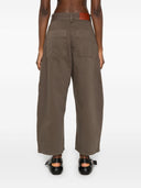 Studio Nicholson pre -largo jeans ritagliato in denim