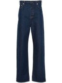 Jeans di cotone in denim gamba larga Gucci
