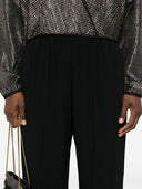Pantalones acampanados de satén fuerte Forte