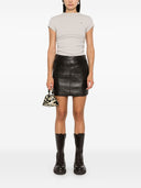 Mini jupe en cuir Parosh