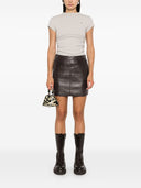 Mini jupe en cuir Parosh