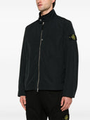 Chaqueta con cremallera del logotipo de Stone Island