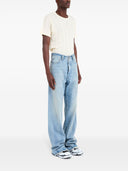 Jeans di cotone in denim Maison Margiela