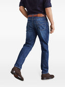 Jeans in denim Brunello Cucinelli con lacrime