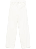 Jeans di denim toteme main gamba