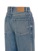 Jeans di cotone a gamba svasata di Saint Laurent