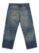 Jeans in denim ritagliati junya watanabe