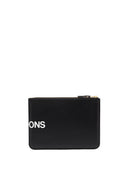 Pochette en cuir à logo Comme Des Garcons