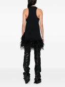 Minivestido con plumas de The Attico