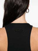 Minivestido con plumas de The Attico