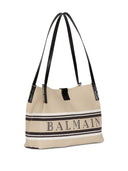 Balmain lance un petit fourre-tout en toile et en cuir