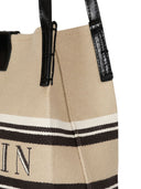 Balmain lance un petit fourre-tout en toile et en cuir