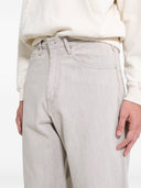 Jeans in denim a gamba larga Auralee