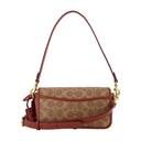 Hobo Studio Baguette Coach en cuir rouille bronzée