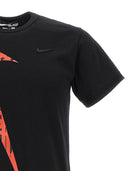 Maglietta da stampa nera Comme des Garcons