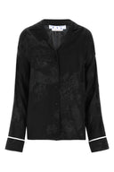 Fuori dalla camicia satinata ricamata bianca